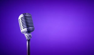 Microphone on purple background